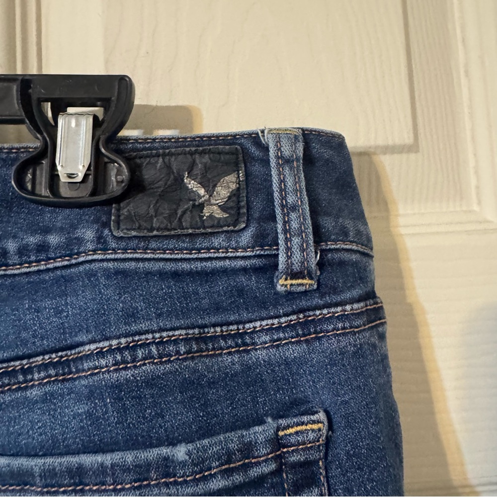 American Eagle Outfitters Blue Ripped Flare Super Stretch Jeans - Picture 6 of 11